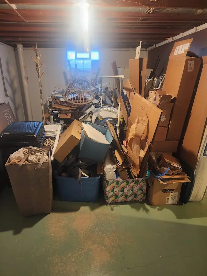 Roll-off dumpster container at job site for Construction Dumpster Rental in Livingston